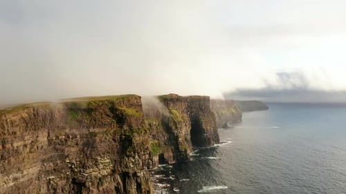 Amazing Panoramic View of High Cliffs Above Rippled Sea
