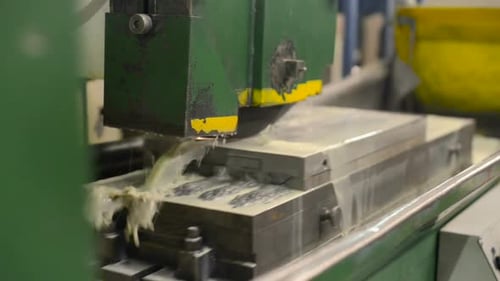 Work of an Industrial Surface Grinding Machine