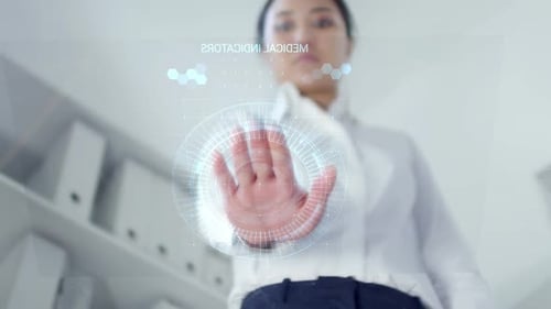 Woman Using Futuristic Device with AR Screen for Medical Checkup