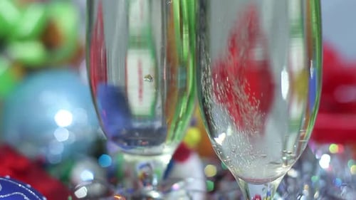 Champagne Glasses Toasted During Christmas Holiday