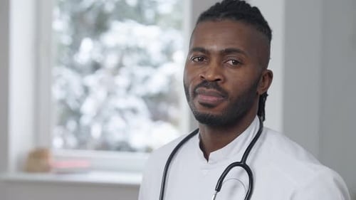 Close Up of Male Doctor in White Coat