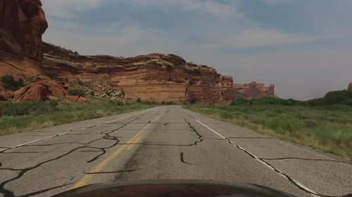 POV driving down scenic road in South West USA