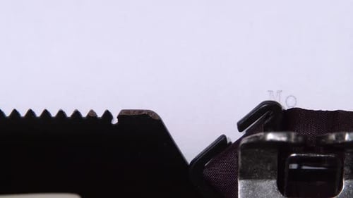 Word Motivation Is Printed on a Sheet of a Typewriter. Close Up