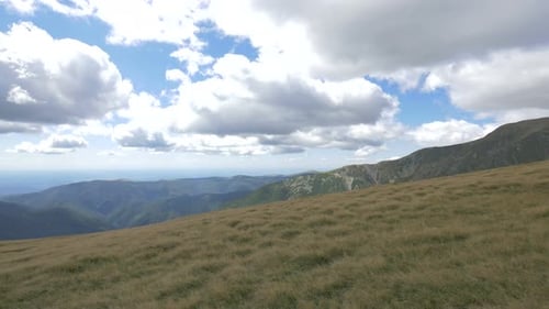 Sweeping Mountain Range Landscape on a Sunny Day