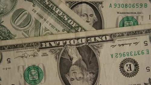 Rotating shot of American money (currency)