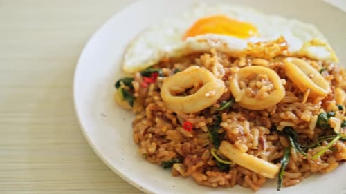 Delicious Fried Rice with Squid Rings and Fried Egg