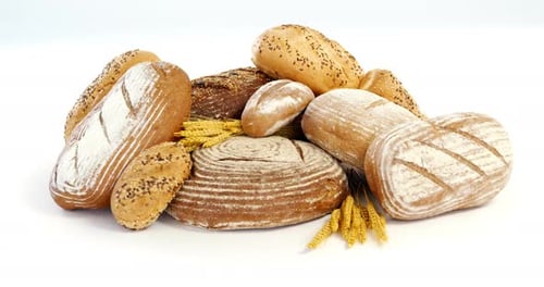 Various types of breads with wheat grains