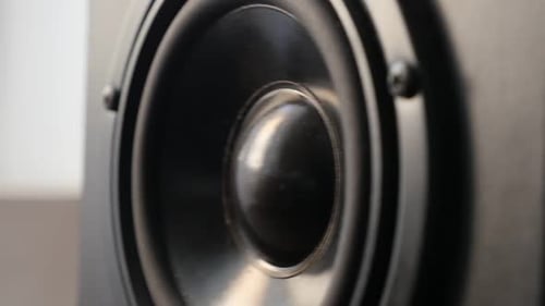 Slow motion bass speaker membrane vibration 1080p FullHD footage - Playing low frequency sound on