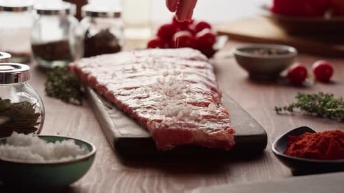 Woman Chef Cooking Ribs Closeup