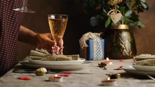 Setting a Romantic Table with Champagne Glasses