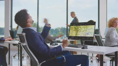 Office Worker Celebrates Success With Colleagues