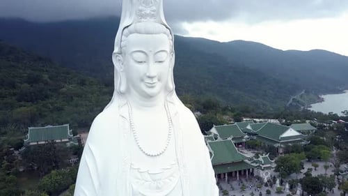 Close Upper View Huge Smiling Buddha Statue Against Forest