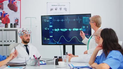 Elderly Woman Researcher Using Medical High Tech Analysing Brain Impulse