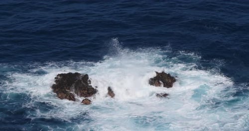 Wave crash into rock coastline, Atlantic Ocean, Porto Moniz, Madeira Island Portugal, Slow Motion 4K