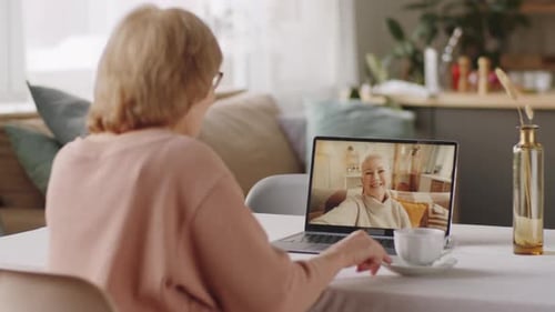 Senior Women Enjoying Video Call on Laptop