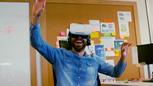 Young Adult Using VR Headset in Modern Office