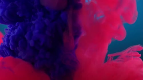 Colorful Ink Plumes Bursting in Water