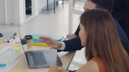 Close up businessman manager meeting with employee discussing project sharing ideas.