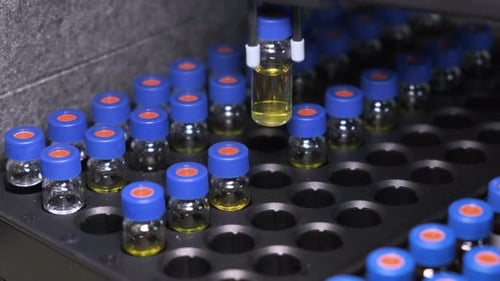 Automated Machine Testing Fluid Samples in Vials
