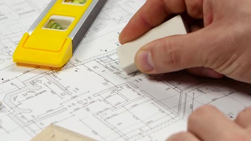 Made Engineer Corrects Errors on the Pencil Drawing. Close Up