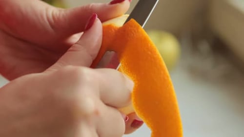 Peeling Orange Peel To Make Fresh Smoothie