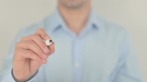 Hand Writes Conclusion with Marker on Clear Surface