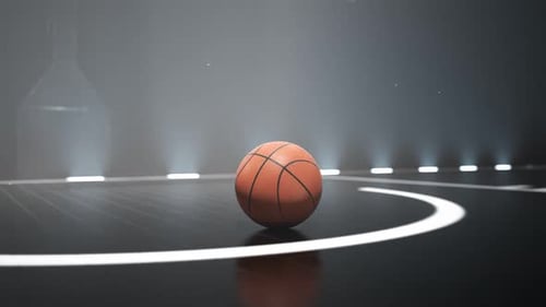 Close-up view at a ball on the basketball court. Nightly scenery. Lighting. 4KHD