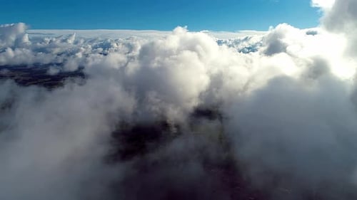 Fog morning at downtown district. Above the clouds.