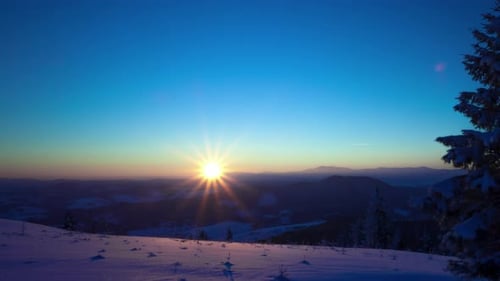 Sunrise Time Lapse in Winter Mountain
