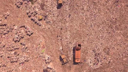 Bird's Eye View of a Garbage Dump Where Machinery Equals Mountains of Household Waste, Ukraine