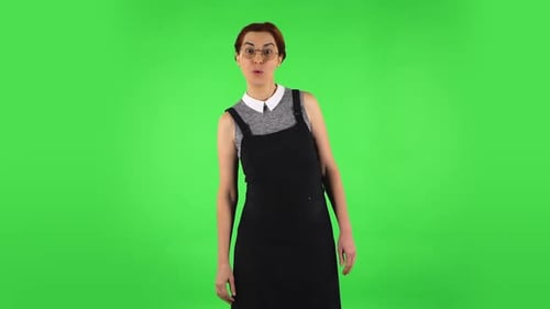 Funny Girl in Round Glasses with Surprised Wow Face Expression. Green Screen