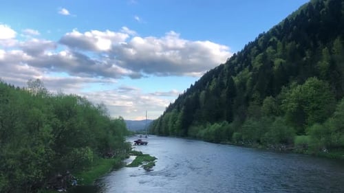 A Tractor Crosses a Mountain River the Beautiful Nature of the Ukrainian Carpathians