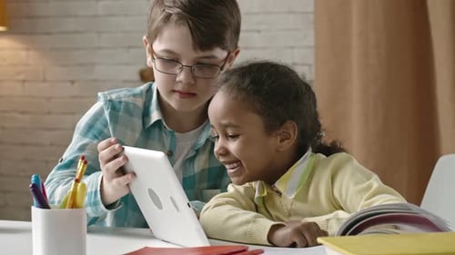 Children Exploring New Gadget