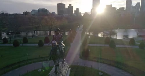 Aerial Pan Around George Washington Statue and Boston Skyline