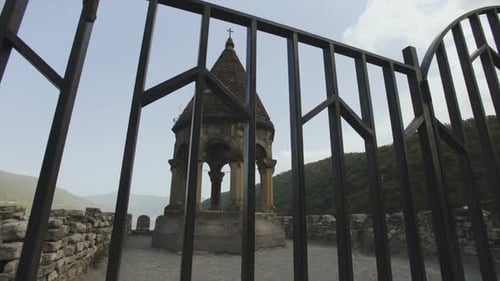 Bell Tower in Old Mountain Church Surrounded By Ananuri Fortress. Historical Buildings in Highland