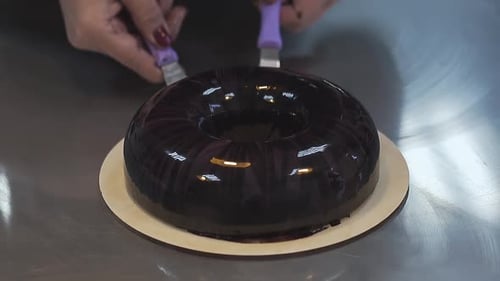 Preparing Dark Chocolate Ring Cake with Glaze