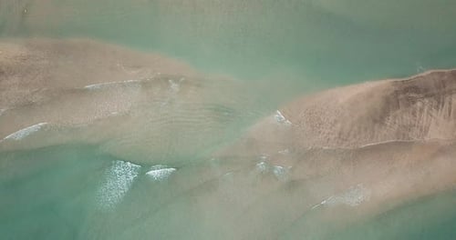 Beautiful beach with sea transparent clean water on both sides. Island concept travel destination.