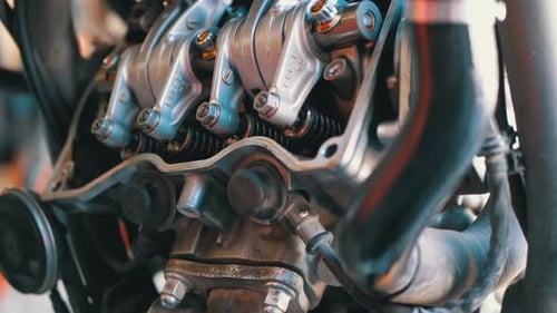 Valves and Valve Mechanisms in Motorcycle Engine. Camshaft Motorcycle Engine