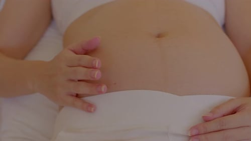 Pregnant Woman's Tummy Close Up