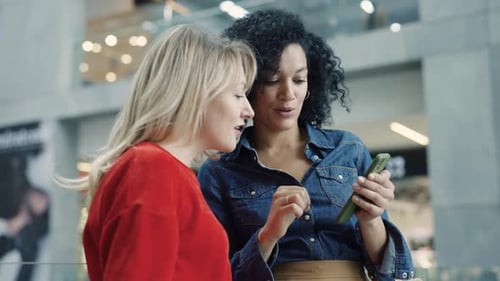 Women Use Smartphone in Modern Urban Setting