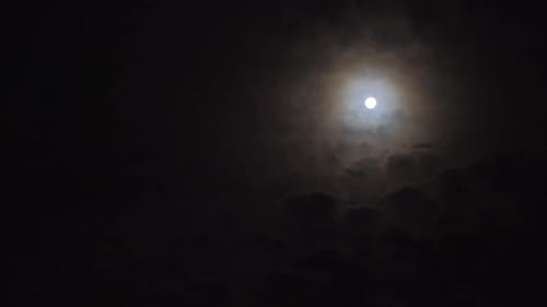 Ethereal Moon Floating in the Dark Night Sky