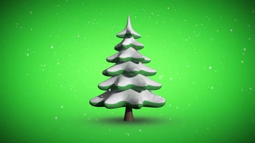 Snow falling on revolving fir tree