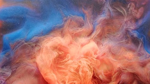 Abstract Orange and Blue Plumes Swirl Slowly