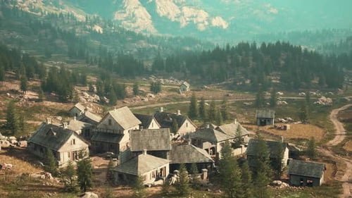 Aerial View of a Rustic Mountain Village in a Forested Valley