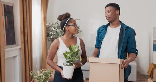 Happy Couple Moving into New Home Together