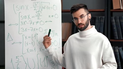Young Adult Man Teaching Math Equations