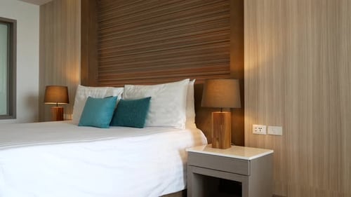 Modern Bedroom With Double Bed and Bedside Lamps