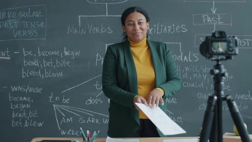 Teacher Explaining English Grammar in the Classroom