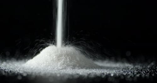 Sugar Is Poured on the Table in a Pile