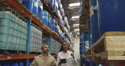 Workers interacting in a warehouse